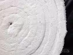 Close-up of rolled white insulation material.
