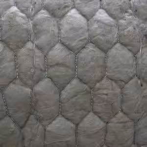 Close-up of rockwool wired mat insulation texture.